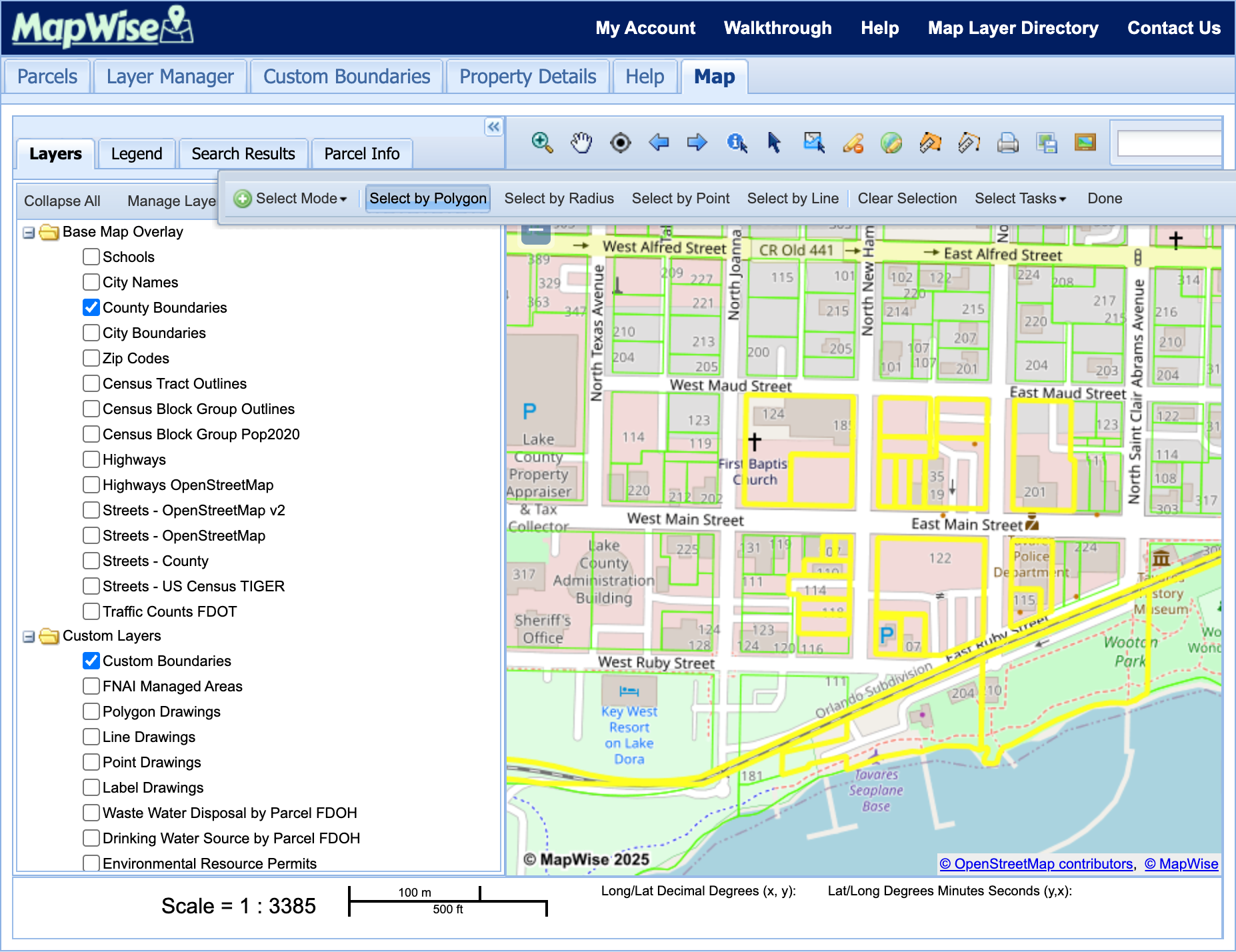 A completed Select by Polygon selection in the Map Viewer: parcels inside the drawn area highlighted yellow on the map, with the Select Parcels toolbar open above and the Layers panel on the left.
