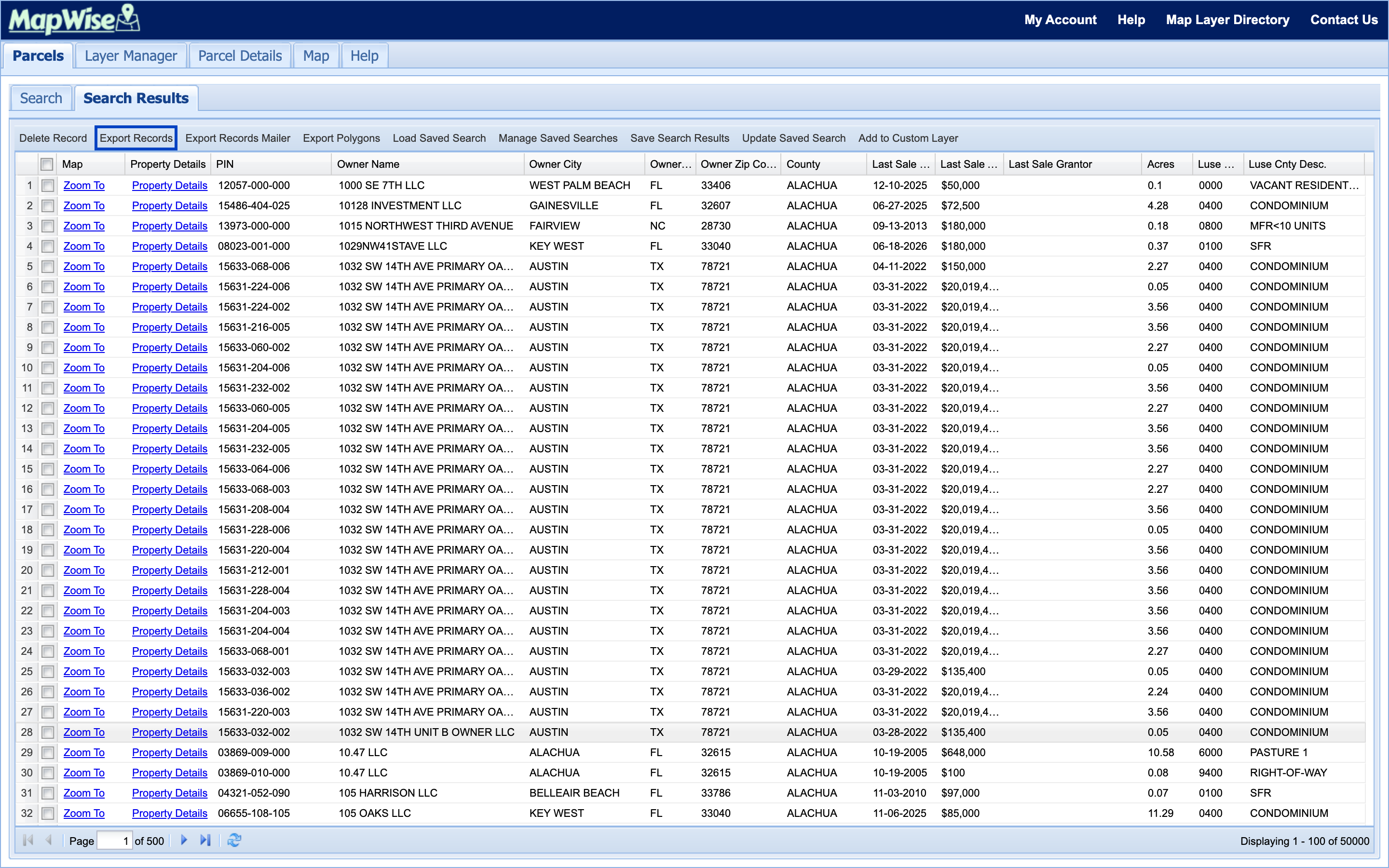 Populated Parcel Search results grid for Alachua County, with the Export Records button highlighted in the toolbar and "Displaying 1 - 100 of 50000" paging text at the bottom.